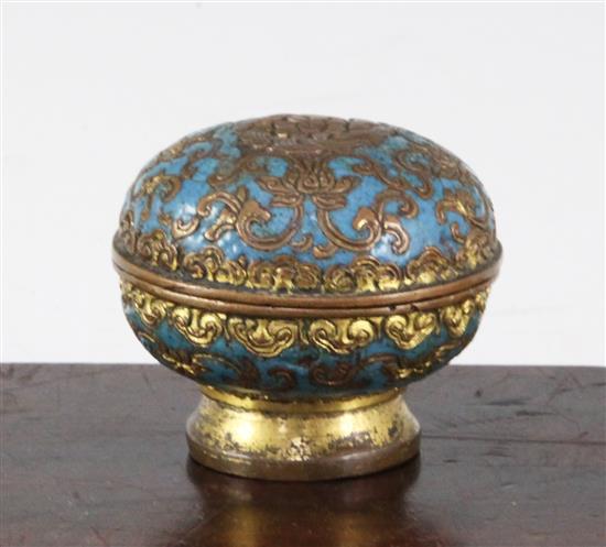 A Chinese gilt bronze and champleve enamel box and cover, 18th century, diam. 6.5cm, wear and minor losses